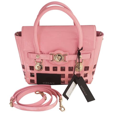 versace handschoenen|Versace pink shopping bag.